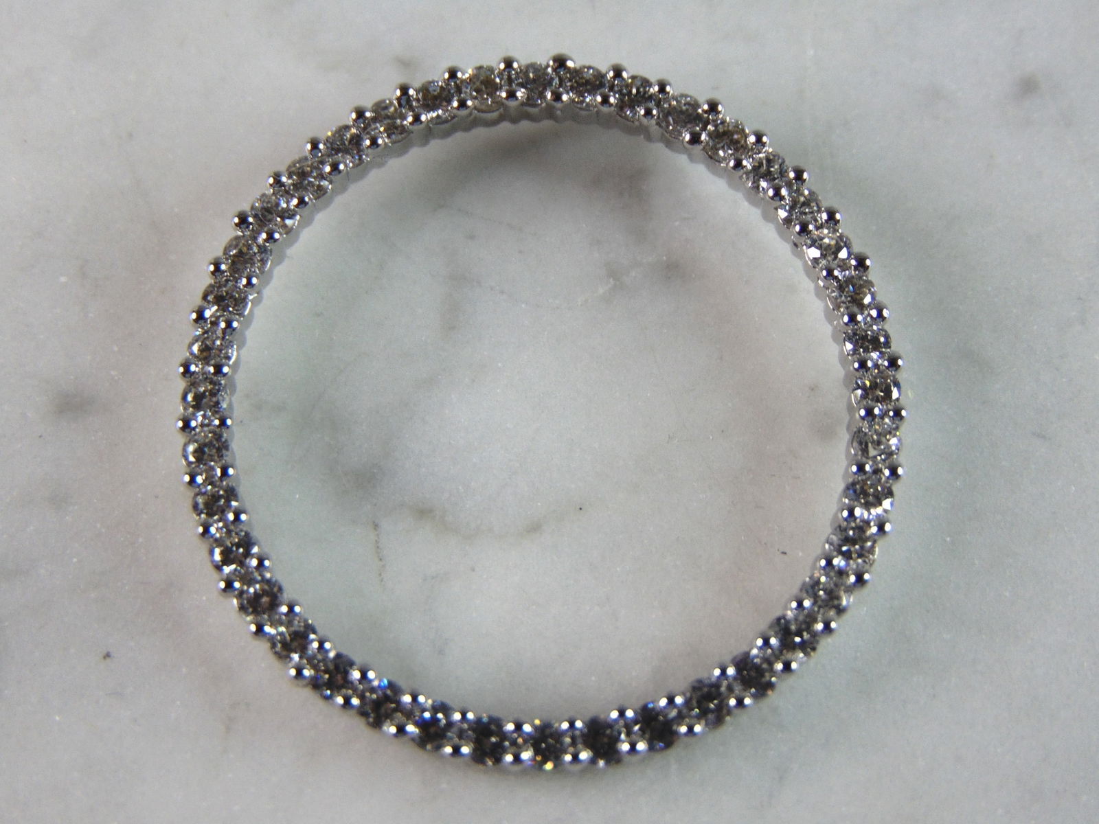 Womens Vintage Estate Sterling Silver CZ Eternity Pendant: FOR SALE IS THIS WOMENS VINTAGE ESTATE STERLING SILVER CZ ETERNITY PENDANT . PENDANT WEIGHS 4.5g AND PENDANT MEASURES 1 3/8" IN DIAMETER. MAKES A GREAT GIFT FOR THAT SOMEONE SPECIAL. IF ANY QUESTIONS,