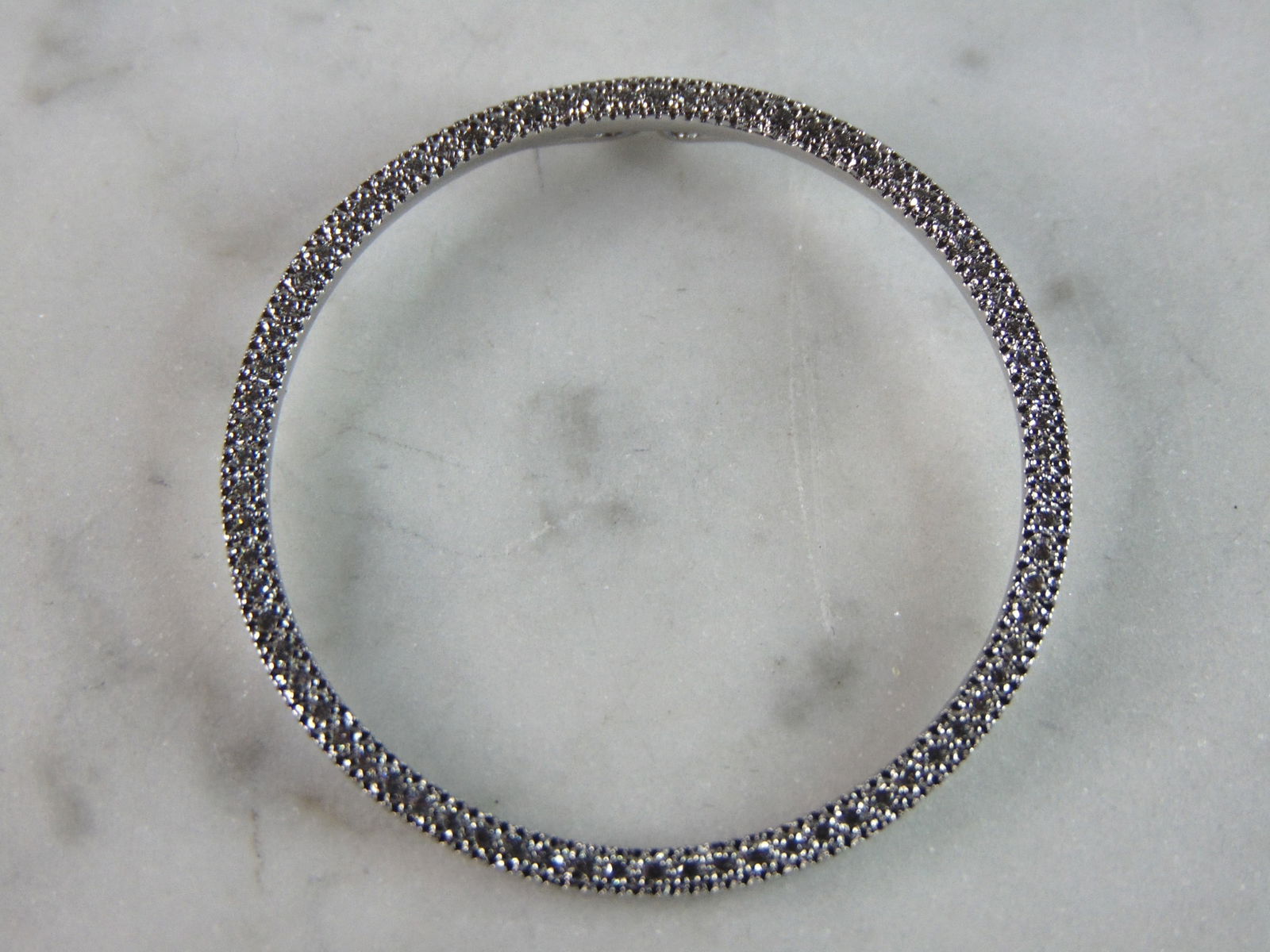 Womens Vintage Estate Sterling Silver CZ Eternity Pendant: FOR SALE IS THIS WOMENS VINTAGE ESTATE STERLING SILVER CZ ETERNITY PENDANT . PENDANT WEIGHS 2.5g AND PENDANT MEASURES 1 3/8" IN DIAMETER. MAKES A GREAT GIFT FOR THAT SOMEONE SPECIAL. IF ANY QUESTIONS,