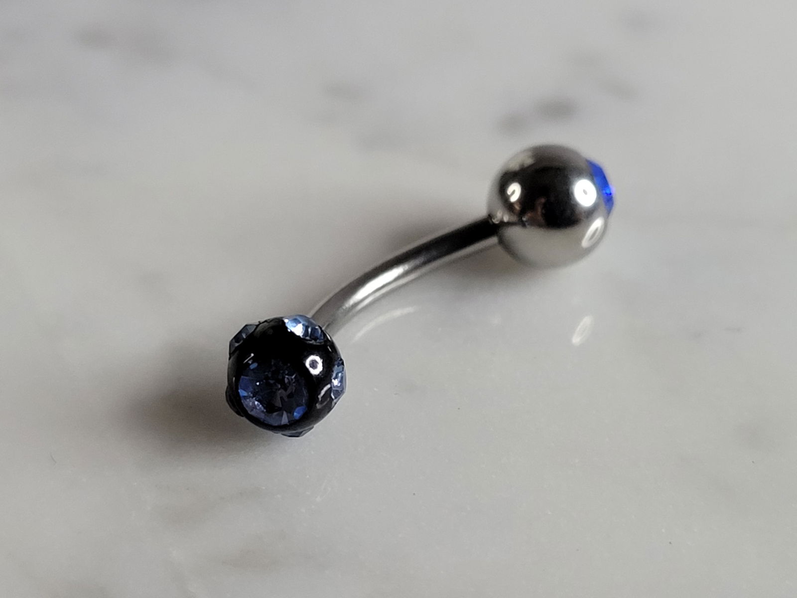 New Surgical Jeweled Nipple Ear Tongue Piercing Barbell: A NEW BODY PIERCING MADE OF SURGICAL STEEL WITH JEWELED BALLS ON EACH END. PIERCING BAR MEASURES 3/4" LONG. ANY QUESTIONS, PLEASE DON'T HESITATE TO ASK. MAKES AN ATTRACTIVE GIFT FOR THAT SOMEONE SPECI