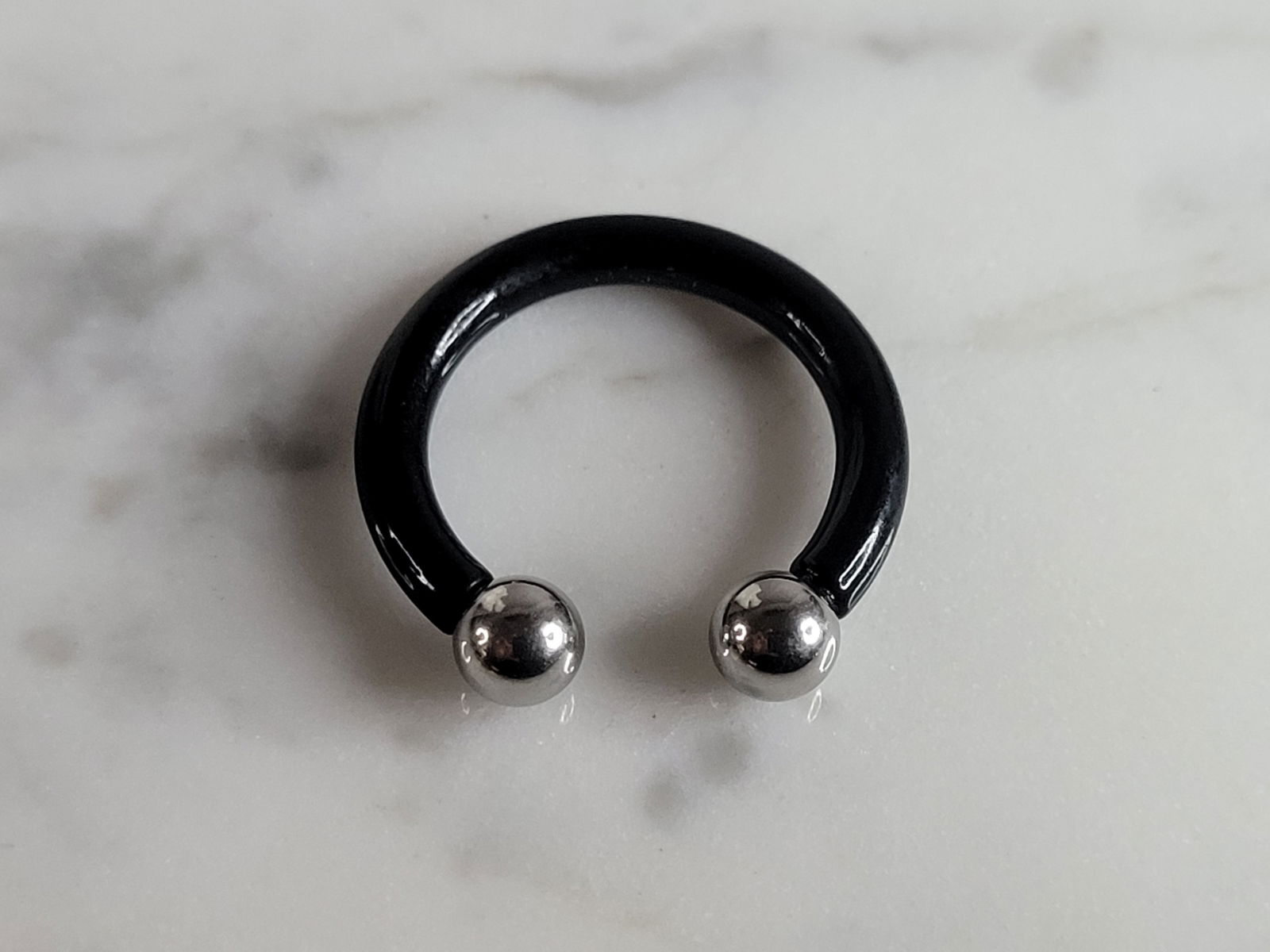 New Surgical Steel Black Horseshoe Nipple Ear Tongue Piercing Bar: A NEW HORSESHOE BODY PIERCING MADE OF SURGICAL STEEL. HORSESHOE RING MEASURES 3/4" WIDE. ANY QUESTIONS, PLEASE DON'T HESITATE TO ASK. MAKES AN ATTRACTIVE GIFT FOR THAT SOMEONE SPECIAL. BE SURE TO CHEC
