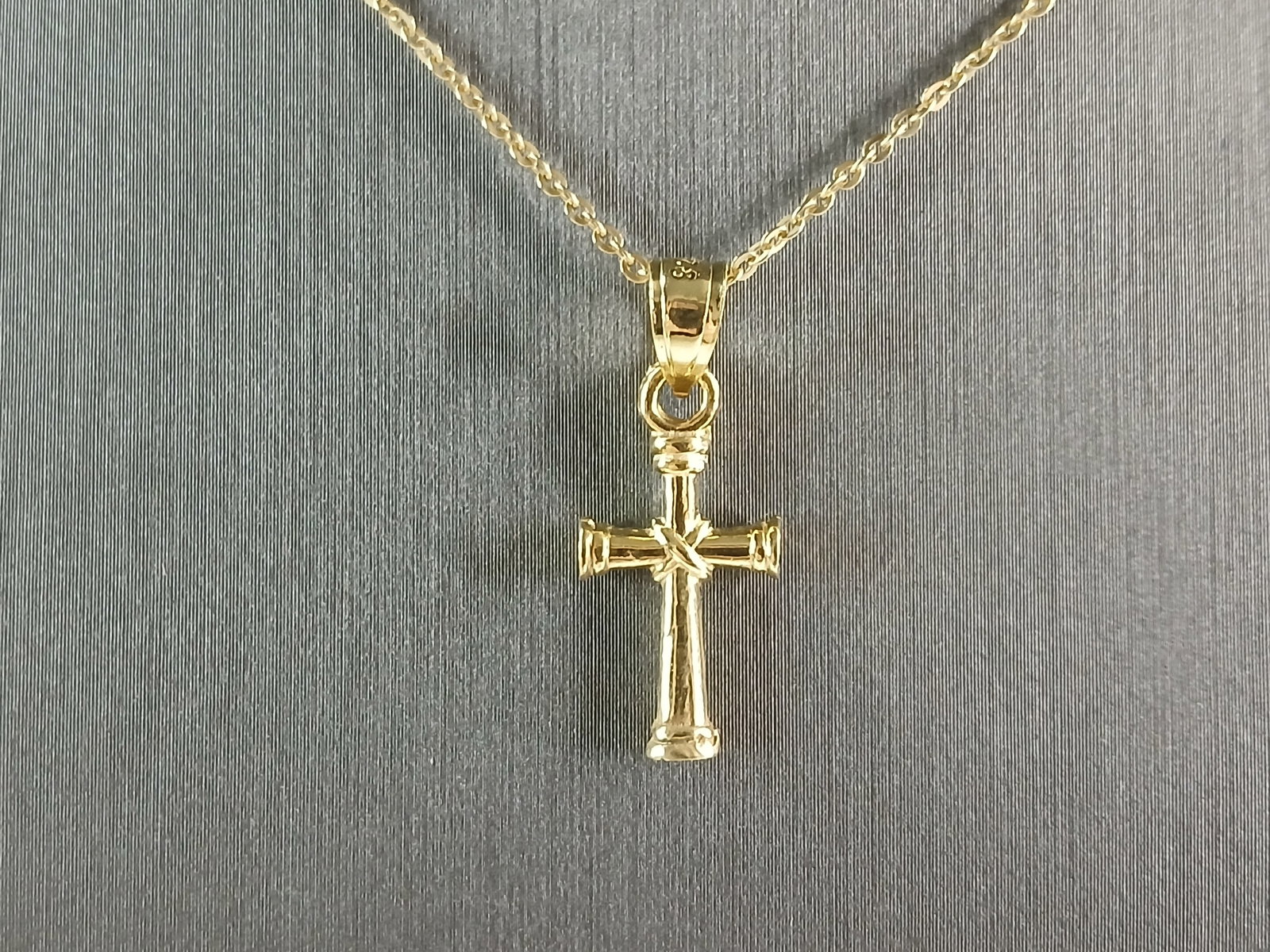 Womens Sterling Silver Gold Tone Religious Cross Necklace: A VERY NICE STERLING SILVER GOLD TONE RELIGIOUS CROSS NECKLACE THAT WEIGHS 2.6g. THE NECKLACE MEASURES 18" LONG AND THE PENDANT MEASURES 7/8" LONG BY 3/8" WIDE. ANY QUESTIONS PLEASE DONT HESITATE TO A