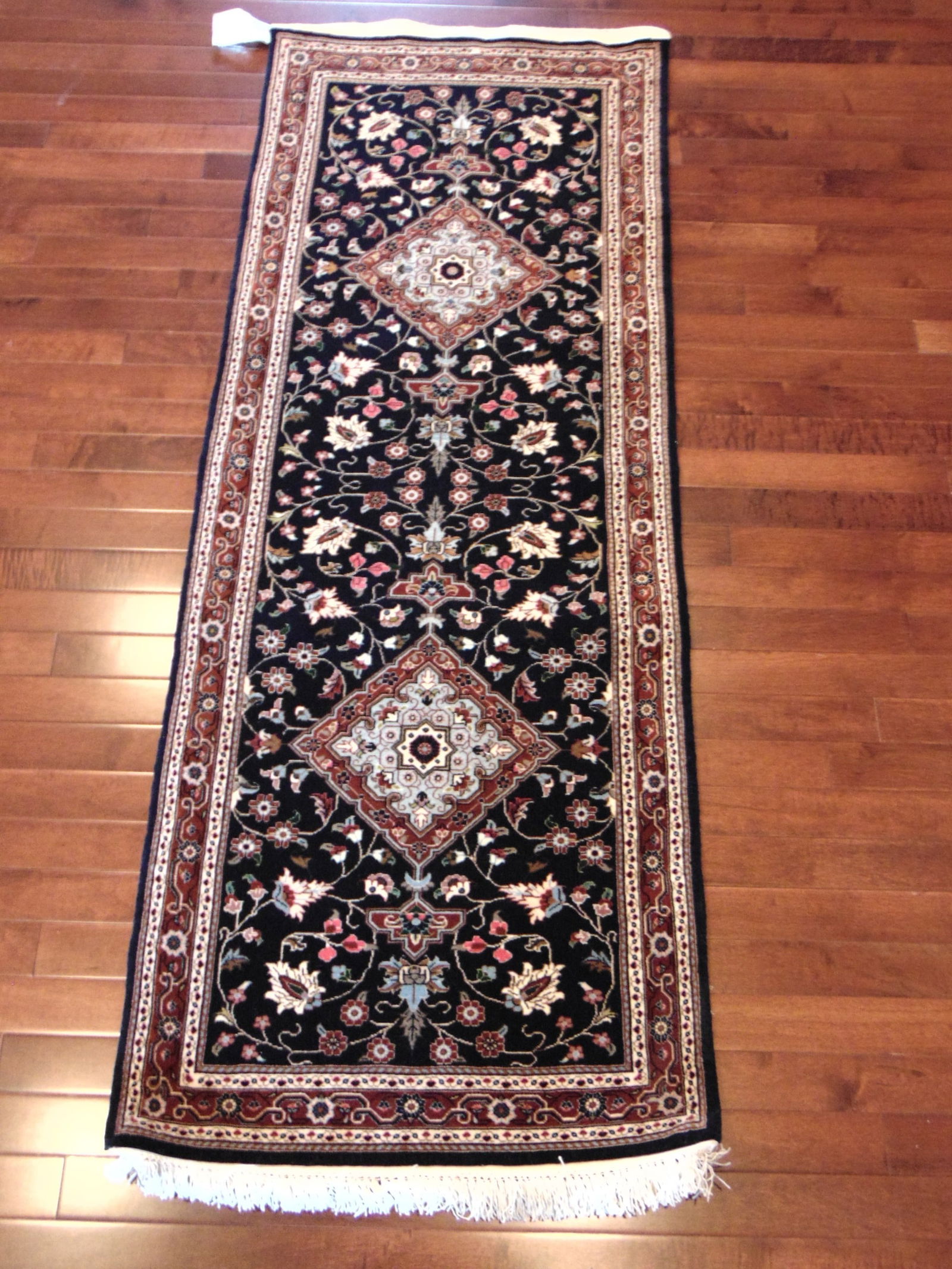 Vintage Estate Semi-Antique Handmade Middle Eastern Runner Rug: A BEAUTIFUL SEMI ANTIQUE HAND MADE HAND KNOTTED QUM RUNNER RUG THAT MEASURES 5' 4" BY 2'. RUG IS MADE FROM 100% WOOL. CONDITION IS GOOD. SHIPPING AND HANDLING IS $75 WITHIN THE CONTINENTAL U.S., ALL O