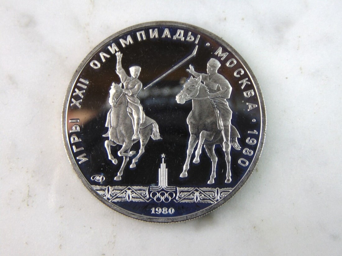 1980 USSR 5 Rubles Summer Olympics Silver Coin: FOR SALE IS THIS 1980 USSR 5 RUBLES SUMMER OLYMPICS SILVER COIN. COIN WEIGHS 16.5g. COIN APPEARS TO BE IN VERY GOOD CONDITION, UNC, AND SOME TONING AROUND THE EDGES, HOWEVER WE ARE NOT COIN EXPERTS WH