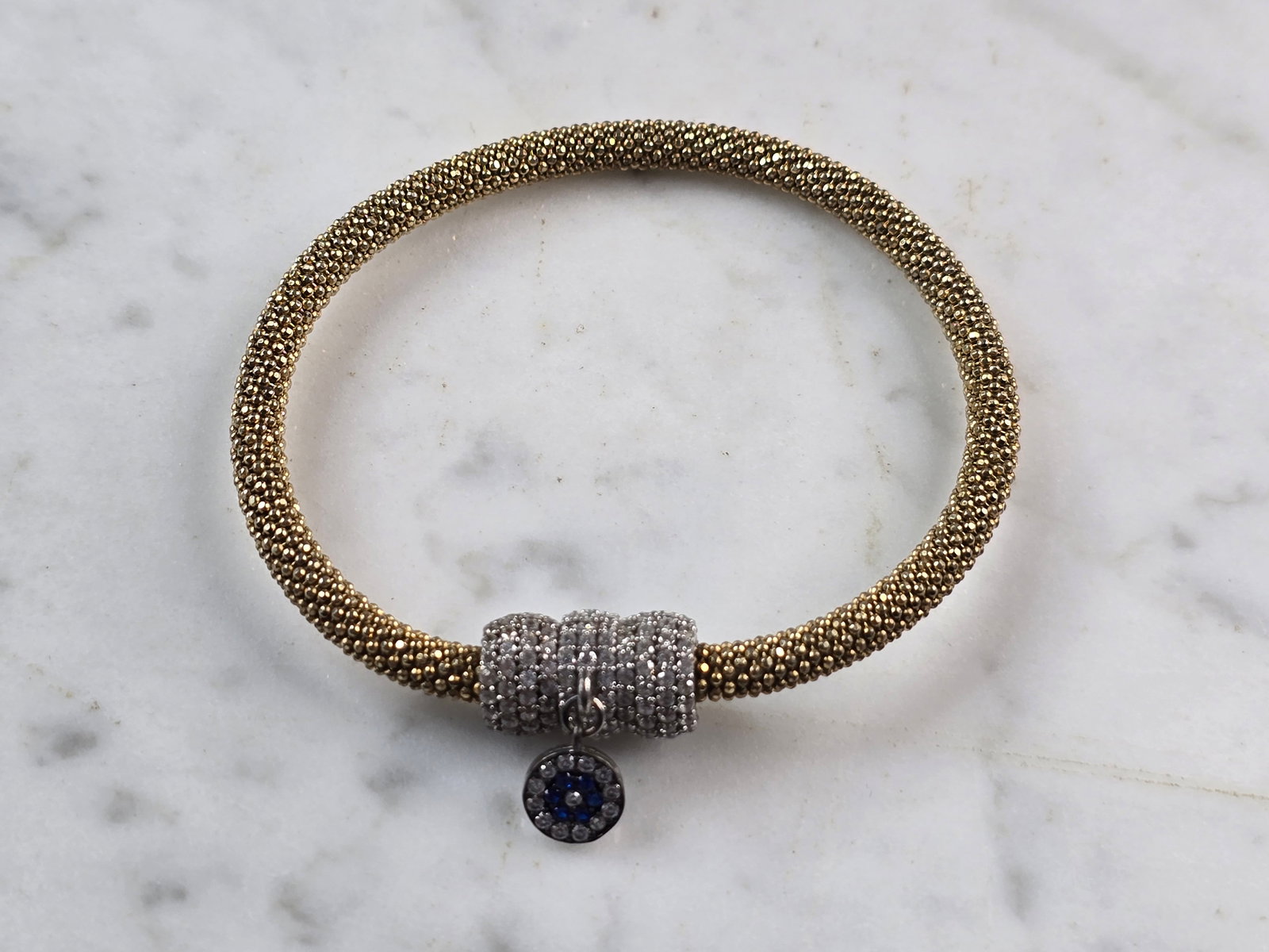 Womens Estate Sterling Silver Gold Tone Mesh Magnetic Bracelet: A WOMENS VINTAGE ESTATE STERLING SILVER GOLD TONE MESH MAGNETIC CLASP BRACELET THAT WEIGHS 13.4g. BRACELET MEASURES 6 3/4" BY 3/8". STONES ARE CZ. ANY QUESTIONS PLEASE DO NOT HESITATE TO ASK. BE SURE