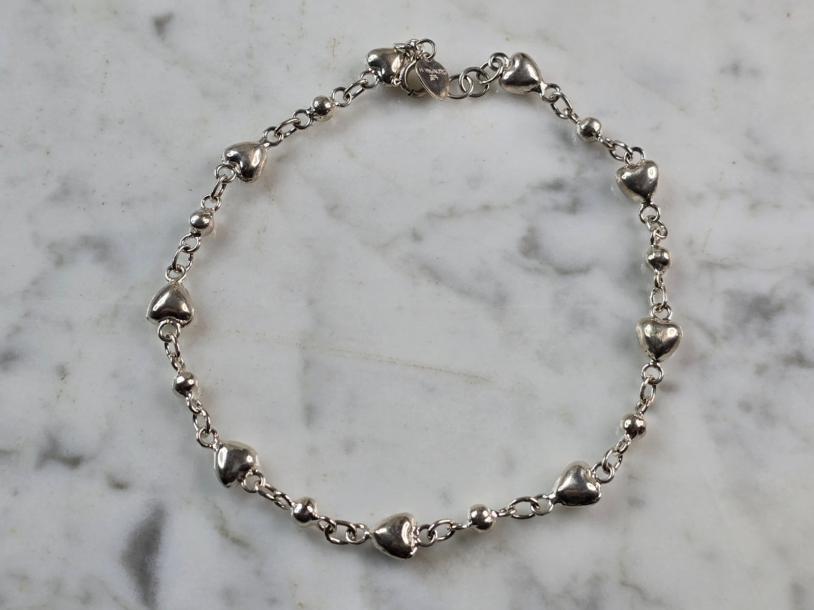 Womens Vintage Estate Sterling Silver Heart Anklet Bracelet: A WOMENS VINTAGE ESTATE STERLING SILVER HEART ANKLET BRACELET THAT MEASURES 10" LONG BY, 1/4" WIDE, AND WEIGHS 7.3g. THIS WOULD MAKE A LOVELY GIFT FOR THAT SOMEONE SPECIAL. ANY QUESTIONS, PLEASE DON'T