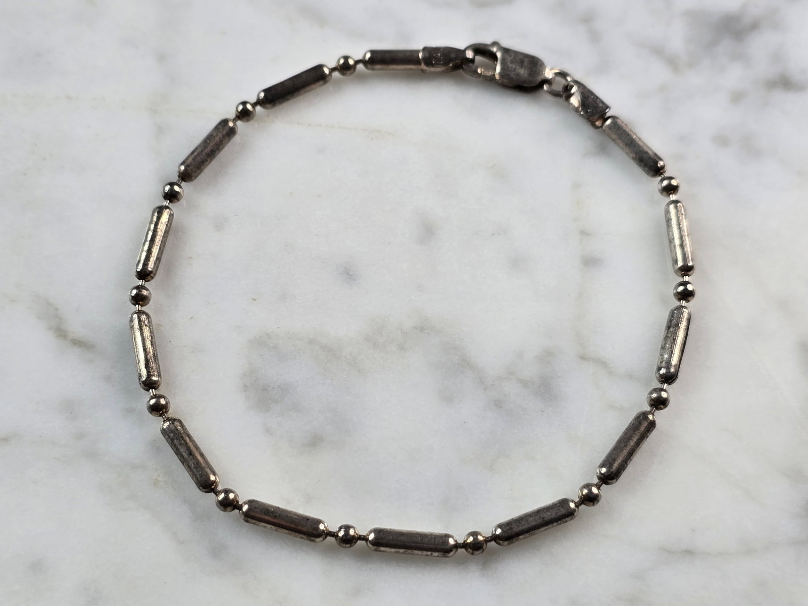 Womens Vintage Estate Sterling Silver Beaded Bracelet: A WOMENS VINTAGE ESTATE STERLING SILVER BEADED BRACELET. BRACELET IS 7 7/8" LONG BY 1/8" WIDE, AND WEIGHS 4.7g. THIS WOULD MAKE A LOVELY GIFT. ANY QUESTIONS PLEASE ASK. BE SURE TO CHECK OUT SOME OF MY