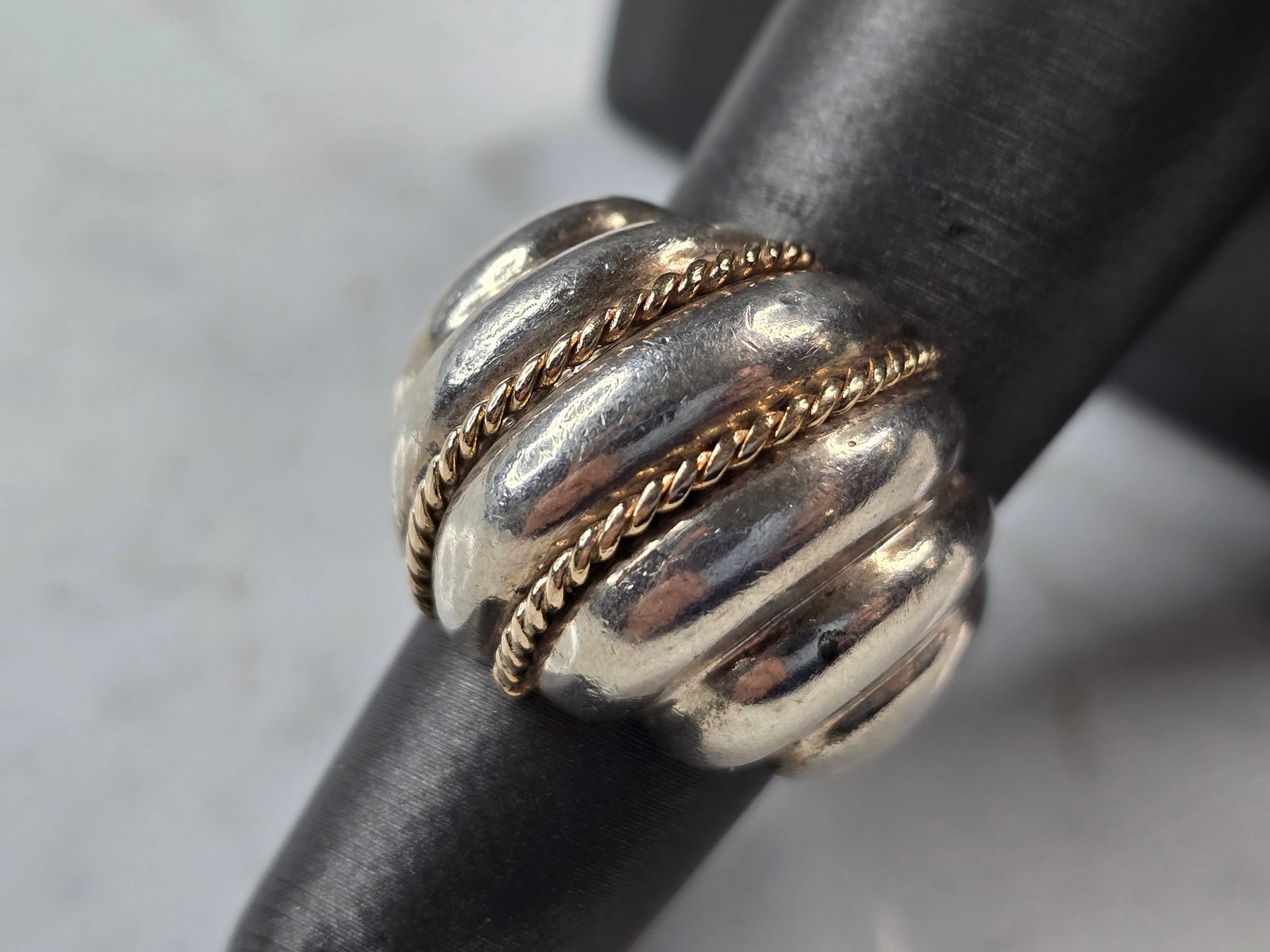 Womens Vintage Estate Sterling Silver 14K Gold Modernist Ring: A WOMENS VINTAGE ESTATE STERLING SILVER & 14K MODERNIST RING. THE TOTAL WEIGHT OF THE RING IS 11.0g. THE RING SIZE IS AN 6.0. THE WIDTH OF THE RING IS 3/4". MAKES A GREAT GIFT FOR THAT SPECIAL SOMEONE