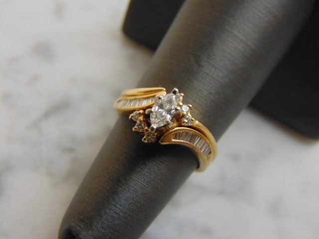 Womens Vintage Estate 14K Yellow Gold Diamond Ring 2pc: FOR SALE IS THIS LOVELY WOMENS VINTAGE ESTATE 14K YELLOW GOLD 2 PIECE DIAMOND RING SET . THE TOTAL WEIGHT IS 4.3g, AND THE RING SIZE IS A 5.25. THE CENTER DIAMOND IS ABOUT .20cts WITH A TOTAL OF ABOUT