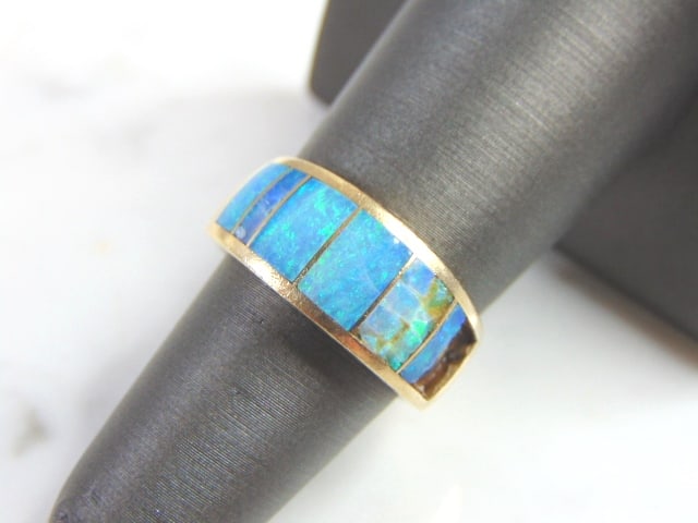 Womens Vintage Estate 14k Yellow Gold Opal Ring: FOR SALE IS THIS UNIQUE VINTAGE 14K GOLD WOMEN'S GOLD RING WITH OPAL. THE RING IS A SIZE 6.25 AND WEIGHS 7.5g. NOT SURE IF THE STONES ARE REAL OR NOT. AS YOU CAN SEE THE RING IS MISSING A SMALL PIECE