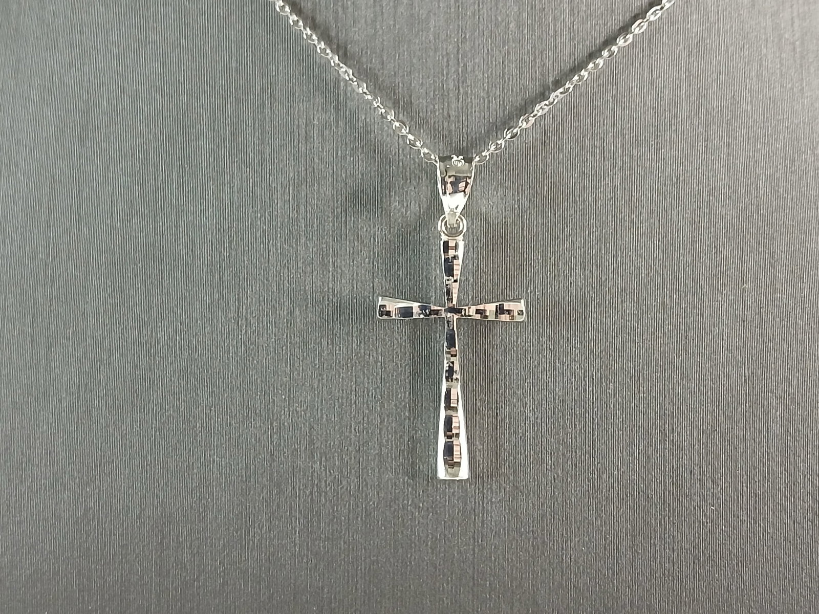 Womens Sterling Silver Religious Modernist Cross Pendant Necklace: A VERY NICE STERLING SILVER RELIGIOUS MODERNIST CROSS PENDANT WITH NECKLACE THAT WEIGHS 2.6g. THE PENDANT MEASURES 1 1/4" LONG BY 1/2" WIDE. THE NECKLACE MEASURES 18" LONG. ANY QUESTIONS PLEASE DONT H