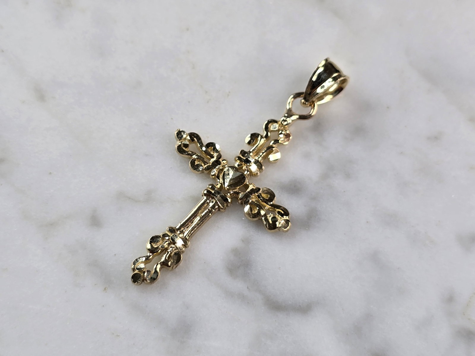 Womens 10k Yellow Gold Religious Crucifix Cross Heart Pendant: A WOMENS 10K YELLOW GOLD RELIGIOUS CROSS PENDANT. THE PENDANT WEIGHS 1.7g, AND MEASURES 1 1/2" LONG BY 3/4" WIDE. ANY QUESTIONS PLEASE DONT HESITATE TO ASK. BE SURE TO CHECK OUT SOME OF OUR OTHER GREA