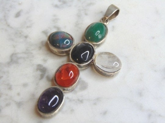 Womens Sterling Silver Multi Stone Cross Pendant: A WOMENS VINTAGE ESTATE STERLING SILVER MULTI STONE CROSS PENDANT. NOT SURE IF STONES ARE REAL OR MAN MADE. PENDANT WEIGHS 26.8g AND PENDANT MEASURES 3 1/2" LONG BY 1 7/8" WIDE. MAKES A GREAT GIFT FOR