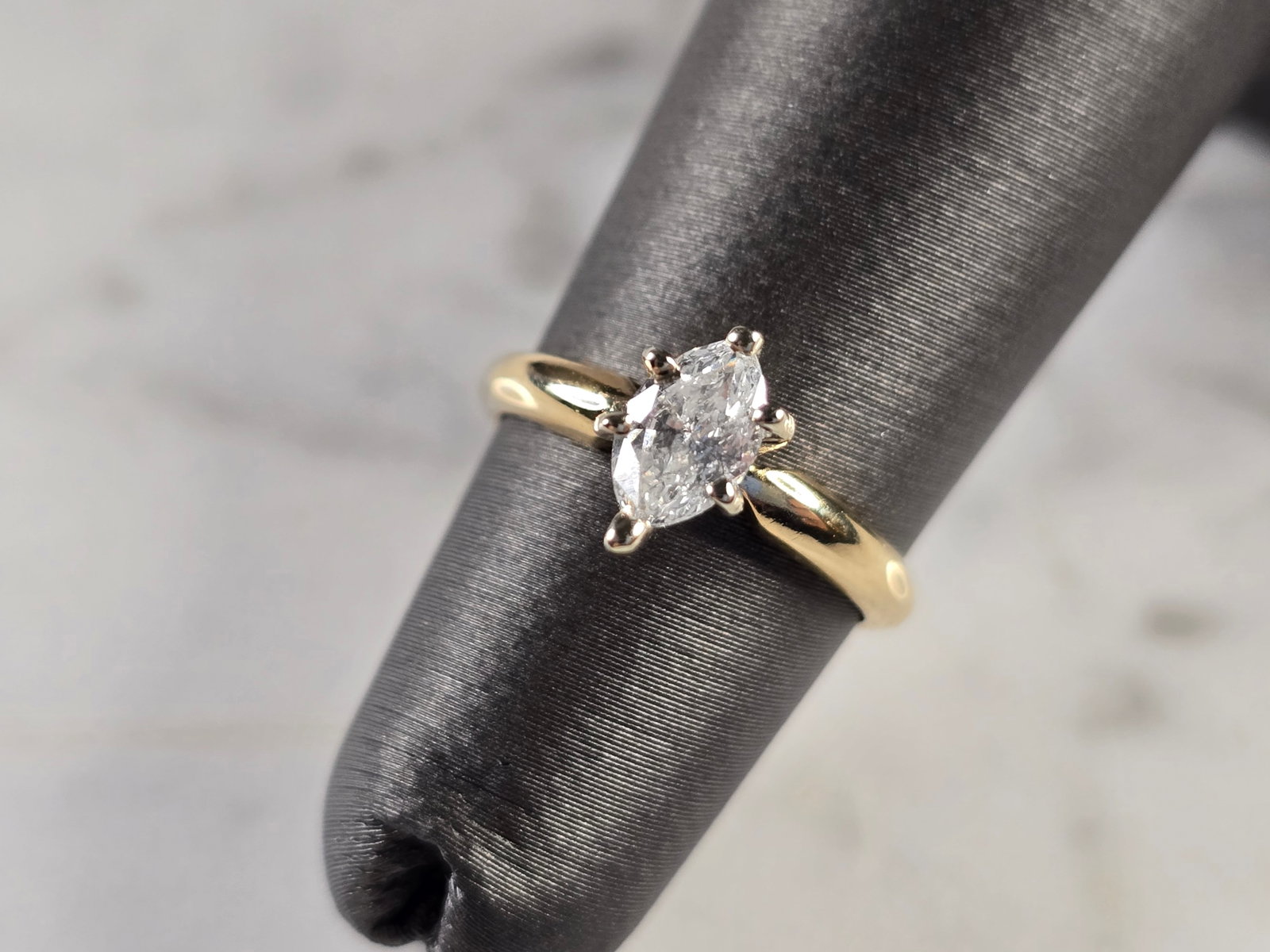 Womens Vintage Estate 14K Gold Marquise Diamond Engagement Ring: A BEAUTIFUL WOMEN'S VINTAGE ESTATE 14K GOLD ENGAGEMENT RING WITH A MARQUISE CUT DIAMOND THAT IS ABOUT .50ct . THE SIZE OF THE RING IS A 3.5, AND WEIGHS 2.1g. MAKES A NICE GIFT FOR THAT SOMEONE SPECIAL
