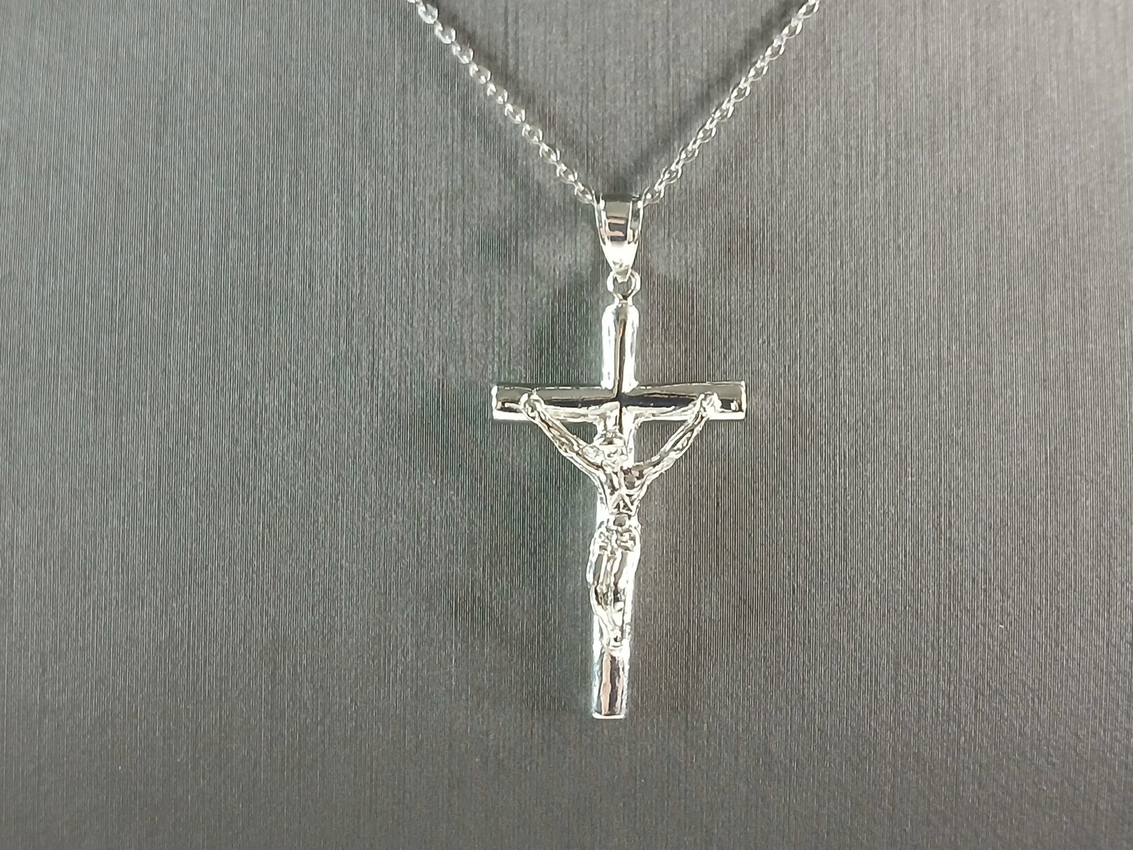 Womens Sterling Silver Religious Cross Pendant Necklace: A VERY NICE STERLING SILVER RELIGIOUS CROSS NECKLACE THAT WEIGHS 5.8g. THE PENDANT MEASURES 1 1/2" LONG BY 3/4" WIDE. THE NECKLACE MEASURES 18" LONG AND IS ADJUSTABLE TO 16" LONG. ANY QUESTIONS PLEASE