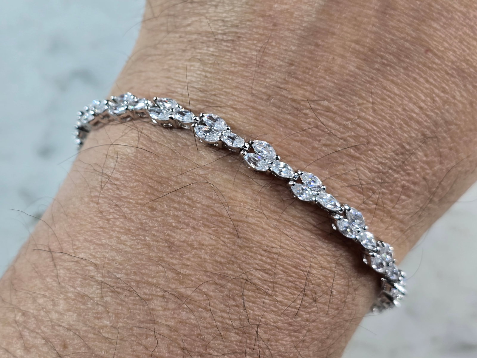 Womens Sterling Silver CZ Tennis Bracelet: A WOMENS STERLING SILVER CZ TENNIS BRACELET. BRACELET IS ABOUT 7 1/4" LONG BY 1/4" WIDE, AND WEIGHS 12.3g. WOULD MAKE A LOVELY GIFT FOR THAT SOMEONE SPECIAL. BE SURE TO CHECK OUT SOME OF MY OTHER GREA