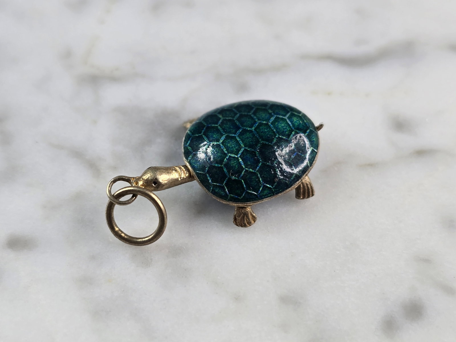 Womens Vintage Estate Asian Cloisonne Enamel Turtle Charm Pendant: A WOMENS VINTAGE ESTATE CLOISONNE ENAMEL TURTLE CHARM PENDANT. THE PENDANT IS MARKED SILVER, HOWEVER NOT SURE OF ITS PURITY THOUGH. THE PENDANT MEASURES 1 1/8" LONG AND 5/8" WIDE. THE NECK SLIDES BACK