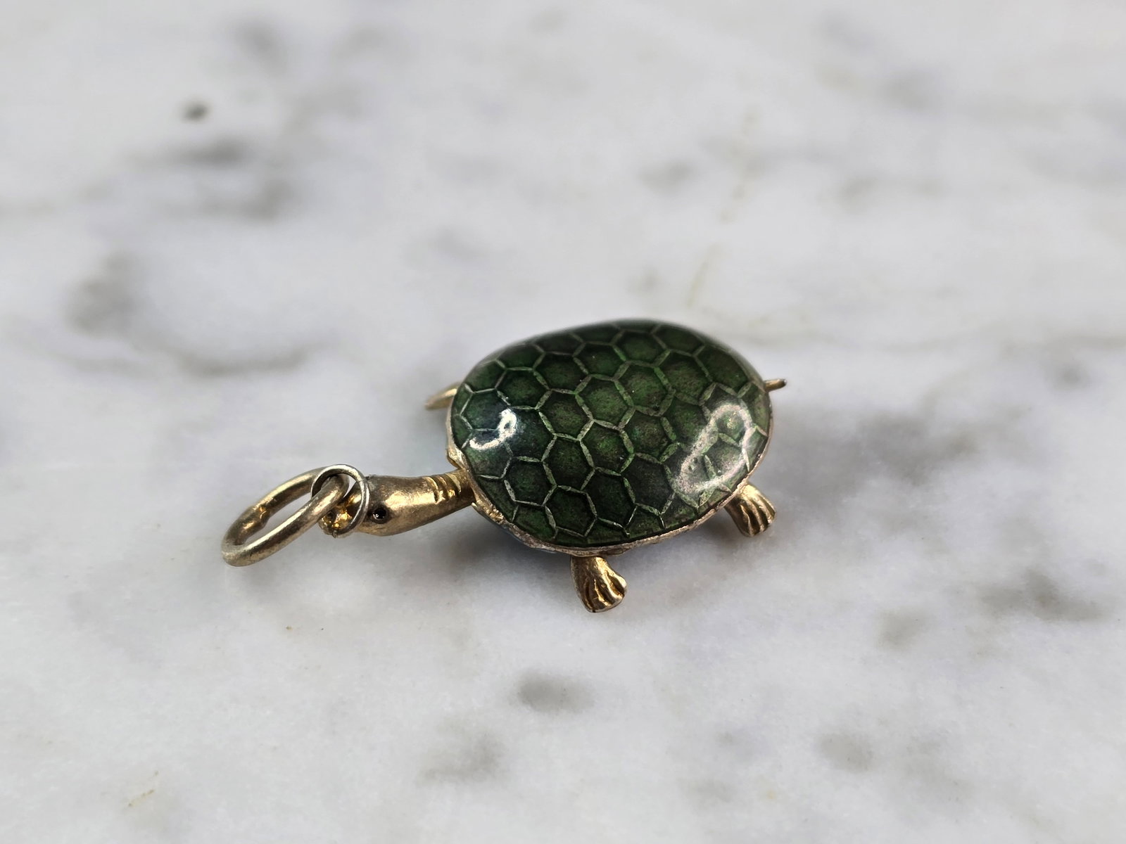Womens Vintage Estate Asian Cloisonne Enamel Turtle Charm Pendant: A WOMENS VINTAGE ESTATE CLOISONNE ENAMEL TURTLE CHARM PENDANT. THE PENDANT IS MARKED SILVER, HOWEVER NOT SURE OF ITS PURITY THOUGH. THE PENDANT MEASURES 1 1/8" LONG AND 5/8" WIDE. THE NECK SLIDES BACK