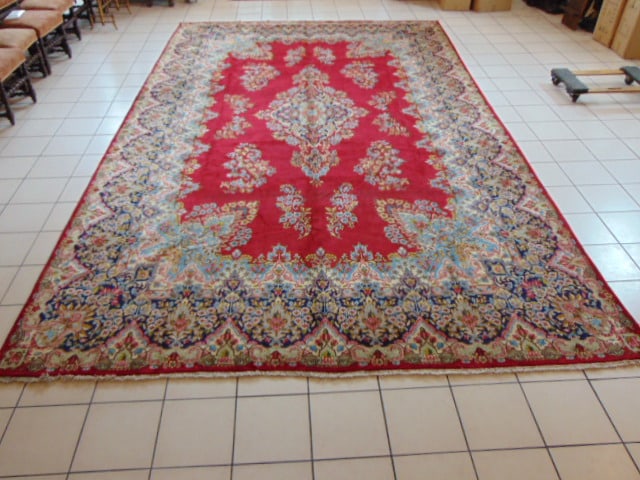 Vintage Estate Semi-Antique Handmade Middle Eastern Kerman Rug: A BEAUTIFUL VINTAGE ESTATE ANTIQUE HANDMADE KERMAN RUG THAT MEASURES 9' 10" BY 16' 8". RUG IS MADE FROM 100% WOOL. SHIPPING AND HANDLING IS $250 WITHIN THE CONTINENTAL U.S., ALL OUR STATES AND COUNTRI