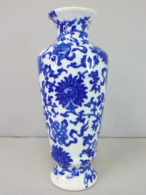 Decorative Chinese Porcelain Floral Cobalt Vase: THIS BEAUTIFUL DECORATIVE CHINESE PORCELAIN COBALT FLORAL COVERED VASE MEASURES ABOUT 9 3/4" TALL BY ABOUT 4" AT ITS WIDEST POINT. HAS A GREAT DECORATIVE LOOK AND IS OF GREAT QUALITY. WOULD MAKE A