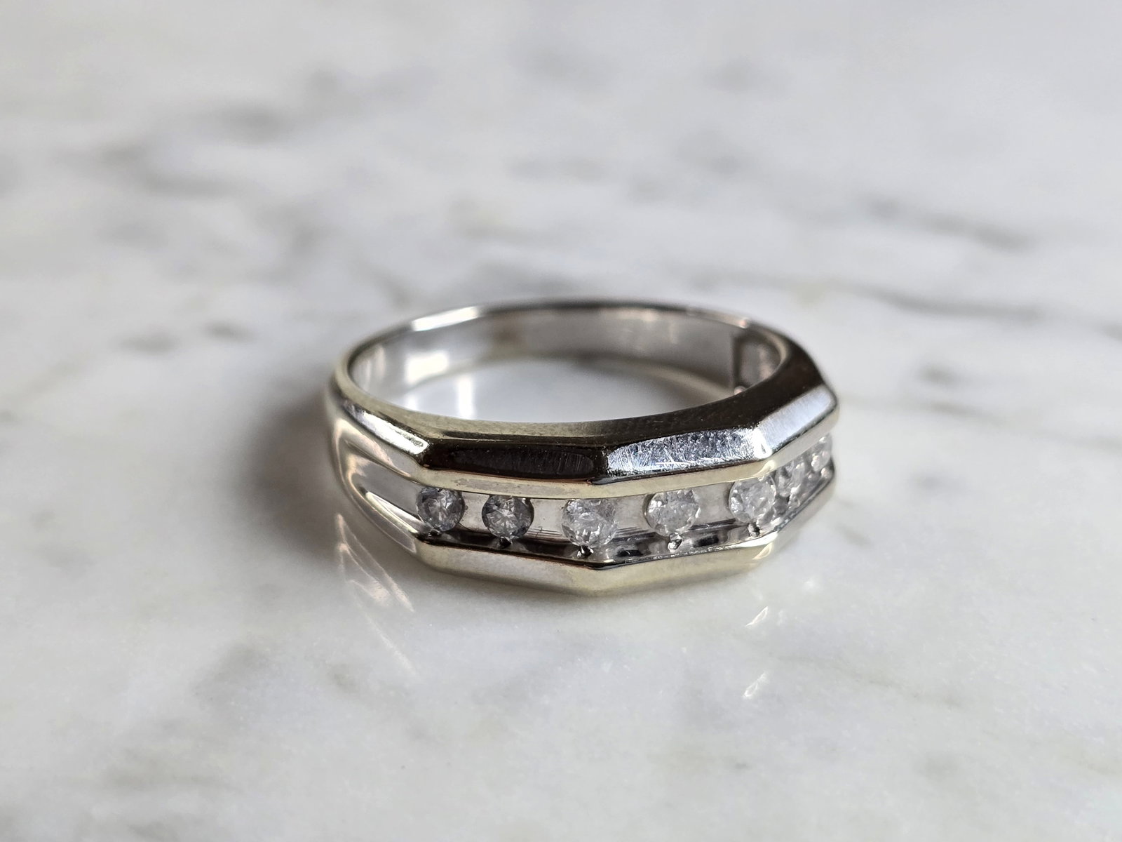 Mens Vintage Estate 14k White Gold Diamond Ring: A MEN'S VINTAGE ESTATE 14K WHITE GOLD RING WITH ABOUT .49cts OF DIAMONDS. THE RING WEIGHS 7.1g, AND IS A SIZE 13.25. THE FACE OF THE RING MEASURES 1/4" WIDE. THIS WOULD MAKE A BEAUTIFUL GIFT FOR SOMEO