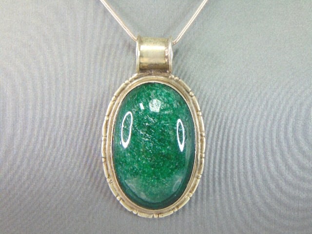 Womens Vintage Sterling Silver Aventurine Necklace: A VERY NICE STERLING SILVER AVENTURINE NECKLACE THAT WEIGHS 39.0g. NOT SURE IF STONE IS NATURAL OR MAN MADE. THE PENDANT MEASURES 2 1/4" BY 1 1/4". THE NECKLACE MEASURES 18" LONG. ANY QUESTIONS PLEASE