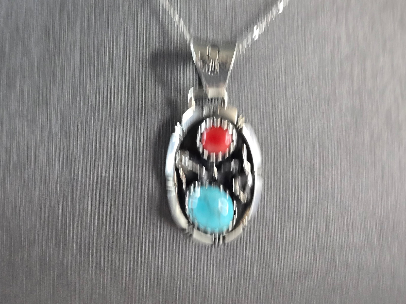 Womens Estate Sterling Silver Turquoise Coral Pendant Necklace: A WOMENS VINTAGE ESTATE STERLING SILVER SOUTHWESTERN TURQUOISE & CORAL PENDANT WITH NECKLACE. THE PENDANT WITH THE NECKLACE WEIGHS 13.9g. THE PENDANT MEASURES 1 3/4" LONG BY 7/8" WIDE. THE NECKLACE ME