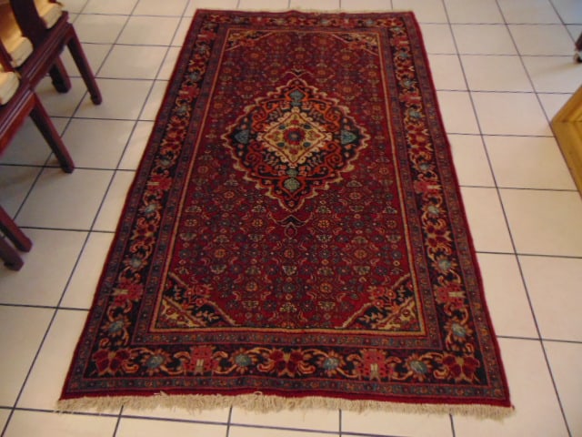 Vintage Estate Semi-Antique Handmade Bijar Rug: A BEAUTIFUL SEMI ANTIQUE HANDMADE HAND KNOTTED BIJAR RUG THAT MEASURES 4' 2" BY 7' . RUG IS MADE FROM 100% WOOL. CONDITION IS GOOD.