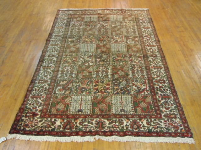 Vintage Estate Semi-Antique Handmade Bakhtiyar Rug: A BEAUTIFUL SEMI ANTIQUE HAND MADE HAND KNOTTED BAKHTUYAR RUG THAT MEASURES 10' BY 6'9". RUG IS MADE FROM 100% WOOL. CONDITION IS GOOD. APPRAISED $5500