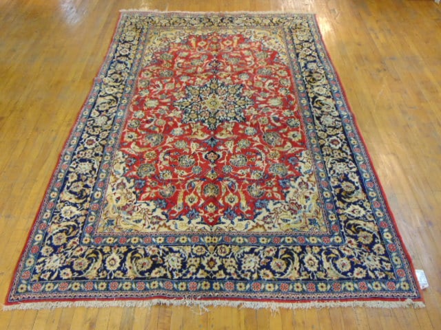 Vintage Estate Semi-Antique Handmade Esphahan Rug: A BEAUTIFUL SEMI ANTIQUE HAND MADE HAND KNOTTED ESPHAHAN RUG THAT MEASURES 10' BY 6'8". RUG IS MADE FROM 100% WOOL. CONDITION IS GOOD. APPRAISED $4500