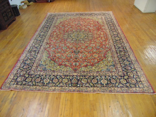 Vintage Estate Semi-Antique Handmade Kashan Rug: A BEAUTIFUL SEMI ANTIQUE HAND MADE HAND KNOTTED KASHAN RUG THAT MEASURES 13'9"BY 9'9". RUG IS MADE FROM 100% WOOL. CONDITION IS GOOD. APPRAISED $18,500