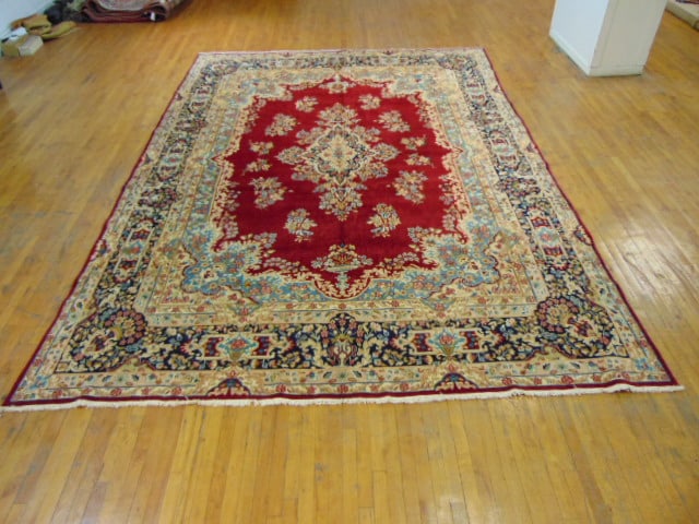 Vintage Estate Semi-Antique Handmade Esphahan Rug: A BEAUTIFUL SEMI ANTIQUE HAND MADE HAND KNOTTED ESPHAHAN RUG THAT MEASURES 13'11"BY 9'8". RUG IS MADE FROM 100% WOOL. CONDITION IS GOOD. APPRAISED $18,500