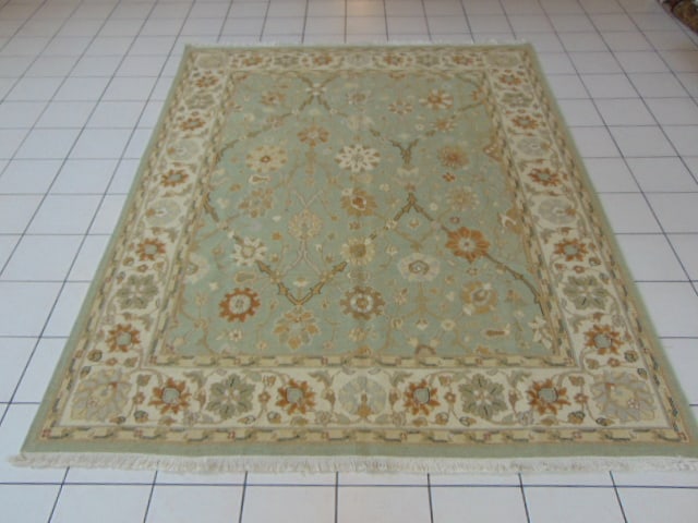 Vintage Estate Handmade Indo Flatweave Rug: A BEAUTIFUL VINTAGE ESTATE HANDMADE INDO FLATWEAVE RUG THAT MEASURES 7' BY 10' . RUG IS MADE FROM 100% WOOL. APPRAISED $7000
