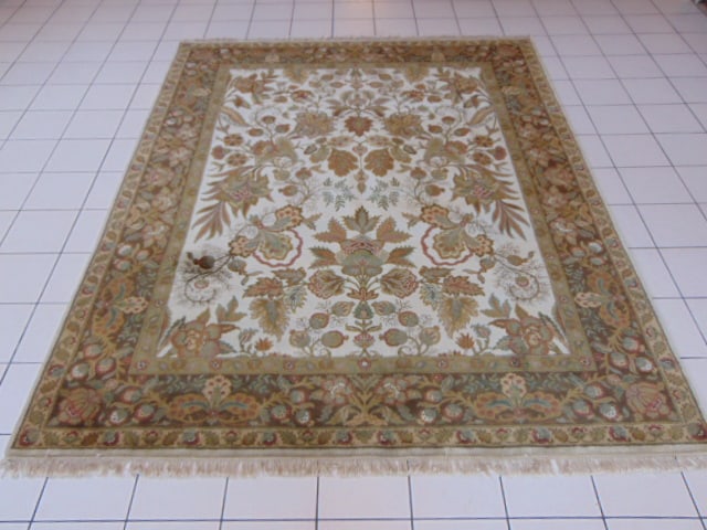 Vintage Estate Handmade Oushak Rug: A BEAUTIFUL VINTAGE ESTATE HANDMADE HANDKNOTTED OUSHAK RUG THAT MEASURES 8' 1" BY 10' 1" . RUG IS MADE FROM 100% WOOL. RUG HAS A STAIN AS SEEN IN THE PICTURES. APPRAISED $8000
