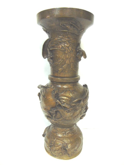 ANTIQUE CHINESE BRASS FLOOR VASE W/ DRAGON CRANES: AN EXQUISITE ANTIQUE CHINESE BRASS FLOOR VASE THAT MEASURES 27 1/2" TALL BY 10 3/4" IN DIAMETER AT THE TOP. CONDITION OF THE VASE IS GOOD FOR ITS AGE BUT AS YOU CAN SEE THERE IS SOME SMALL BITS OF DAM