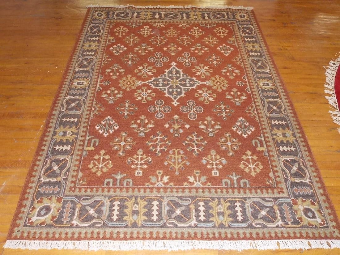 HANDMADE INDO SUMACK FLATWEAVE RUG 5.9 X 8 RUST/BROWN: Up for sale is this nice decorative handmade Indo Sumack flatweave rug. Rug measures 5.9' by 7.11'. Rug has a retail value of $3275. Comes with a certified appraisal to be sent in the mail at a later 
