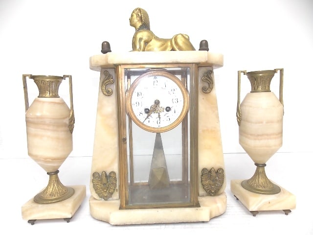 Antique Japy Freres Sphinx Mantel Clock w/ Garnitures: For sale is this Japy Frerese & Med D'Honneur alabaster mantel clock w/ garnitures. The clock measures 15 3/4" tall by 11" long by 4 1/2" wide. The garnitures each measure 10 7/8" tall with a 3 1/2" s