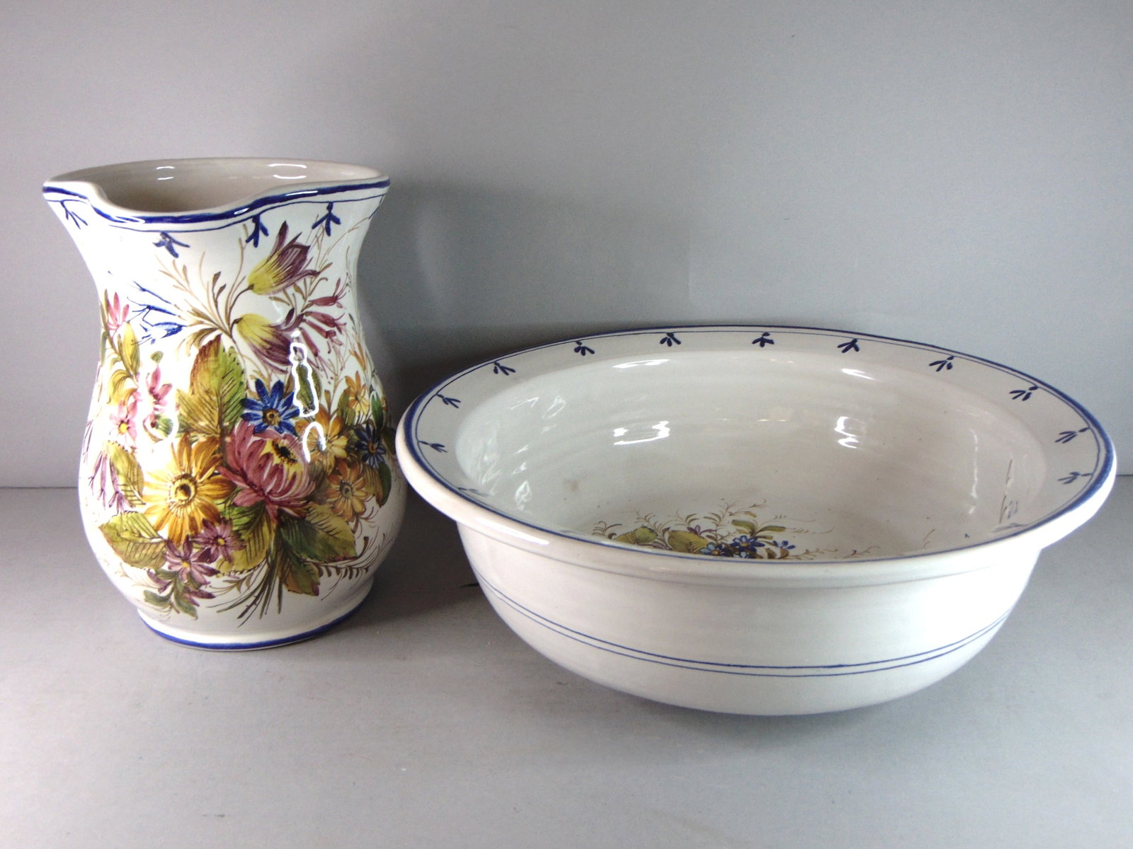 Vintage Estate Decorative Floral Porcelain Wash Basin & Pitcher: A LOVELY VINTAGE ESTATE DECORATIVE FLORAL PORCELAIN WASH BASIN & PITCHER BY ANTIONIO ZEN NOVE. PITCHER MEASURES ABOUT 9" TALL BY 8 7/8" LONG AND 6 1/4" WIDE, THE BOWL MEASURES 4 5/8" TALL BY 13 1/2" W