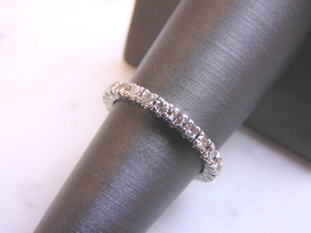 Womens 14K White Gold Diamond Eternity Ring: FOR SALE IS THIS LOVELY VINTAGE 14K WHITE GOLD RING WITH A TOTAL OF ABOUT .81cts OF DIAMONDS. THE TOTAL WEIGHT IS 3.6g, AND IS A SIZE 6.25. THE FACE MEASURES 1/8" WIDE. RING IS NOT MARKED BUT IT HAS B