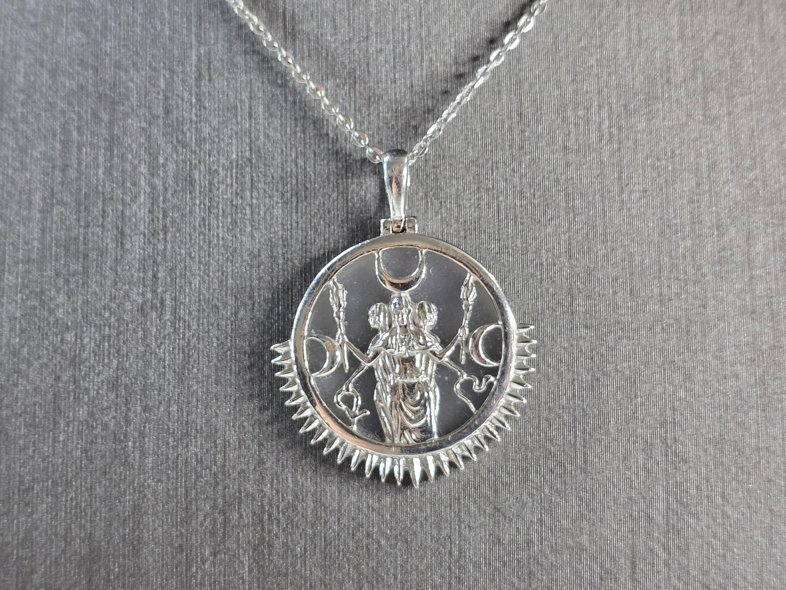 Womens Estate Sterling Silver Hecate Goddess Pendant Necklace: A WOMENS ESTATE STERLING SILVER HECATE GODDESS PENDANT WITH NECKLACE . THE PENDANT MEASURES 1 1/8" LONG BY 7/8" WIDE. THE NECKLACE MEASURES 18" LONG AND IS ADJUSTABLE TO 16" LONG. TOGETHER THEY WEIGH 