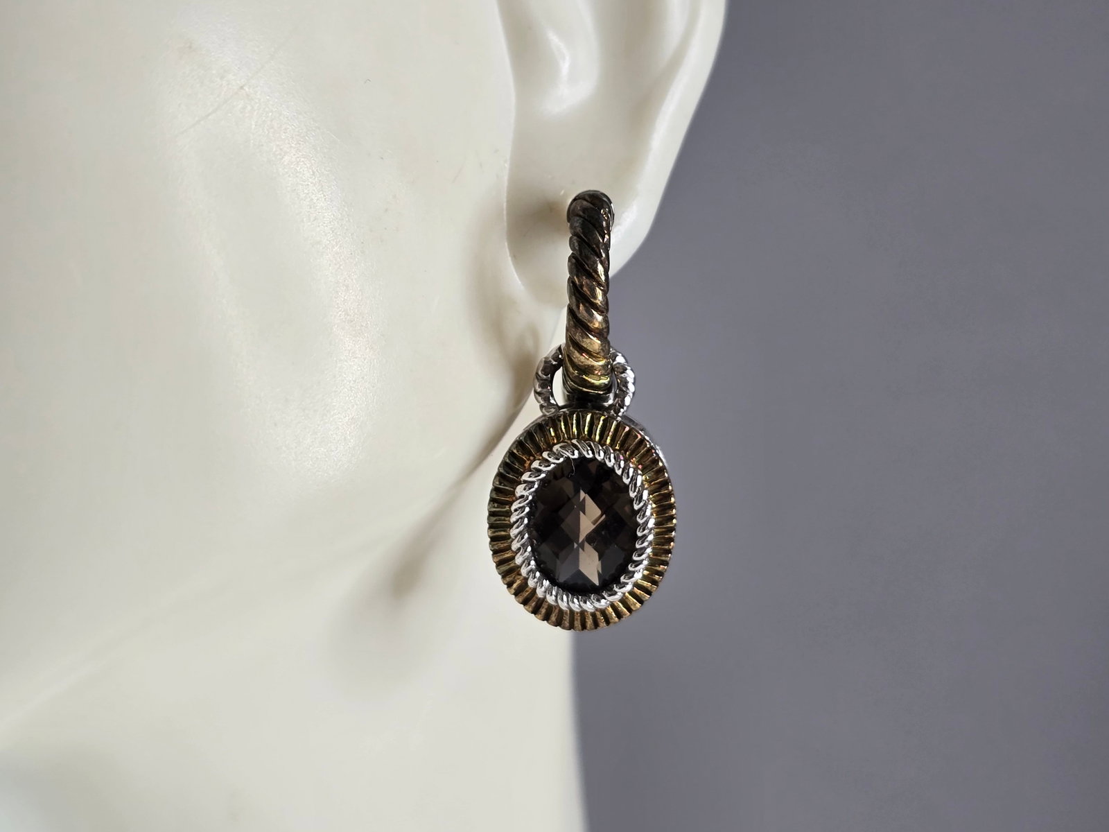 Womens Vintage Estate Sterling Silver Gold Tone Smoky Quartz Earrings: A PAIR OF WOMENS VINTAGE ESTATE STERLING SILVER GOLD TONE EARRINGS, WITH SMOKY QUARTZ STONES. THE EARRINGS WEIGH 9.0g, AND MEASURE 1" LONG BY 1/2" WIDE. NOT SURE IF THE STONES ARE NATURAL OR MAN MADE.