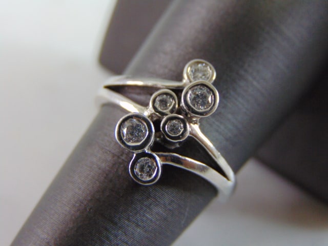 Womens 14K White Gold Diamond Ring: FOR SALE IS THIS 14K WHITE GOLD DIAMOND RING WITH ABOUT .51cts OF DIAMONDS IN IT. THE RING WEIGHS 4.7g. THE SIZE OF THE RING IS A 7.75. THIS MAKES A LOVELY GIFT FOR THAT SOMEONE SPECIAL. ANY QUESTIONS