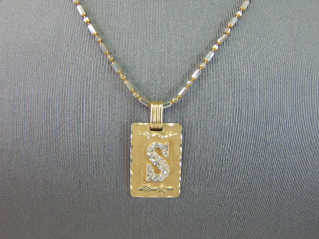 Womens Vintage Estate 14K Gold Necklace S Pendant: A WOMENS VINTAGE 14K GOLD NECKLACE WITH A 14K GOLD "S" PENDANT. THE TOTAL WEIGHT IS 4.8g. THE NECKLACE MEASURES 16" LONG BY 1/16" WIDE. THE PENDANT MEASURES 7/8" BY 1/2". BOTH ARE MARKED 14K. MAKES A 
