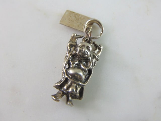 Womens Vintage Estate Sterling Silver Buddha Charm: FOR SALE IS THIS WOMENS VINTAGE ESTATE STERLING SILVER BUDDHA CHARM. CHARM WEIGHS 4.0g AND MEASURES 1 1/8" LONG BY 1/2" WIDE. MAKES A GREAT GIFT FOR THAT SOMEONE SPECIAL. ANY QUESTIONS, PLEASE ASK. BE