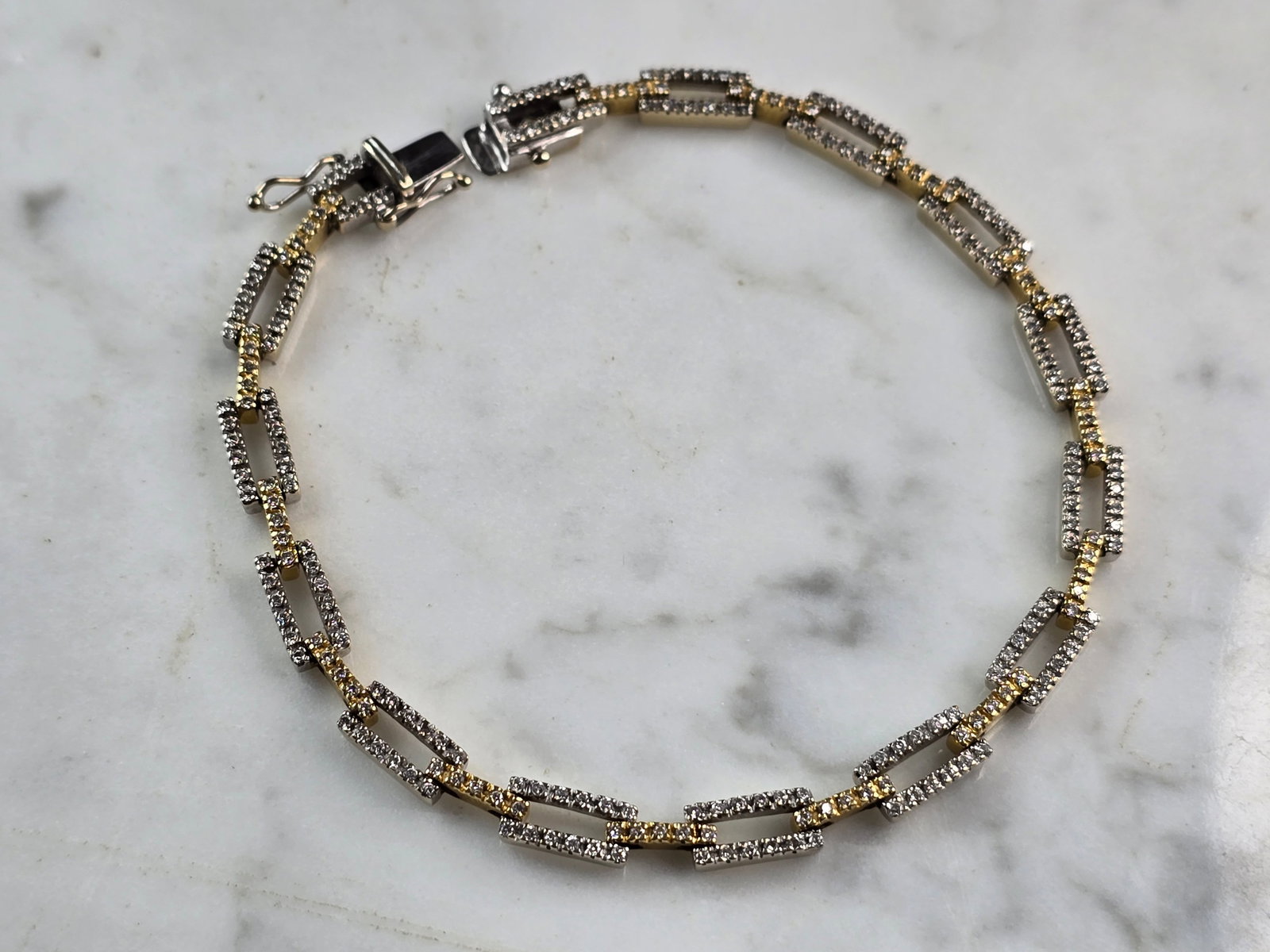 Womens Vintage Estate 18K Gold Diamond Bracelet: A WOMENS VINTAGE ESTATE 18K GOLD DIAMOND BRACELET. THE BRACELET MEASURES 8" LONG BY 1/4" WIDE , AND WEIGHS 14.7g. THERE ARE ROUGHLY 243 TINY DIAMONDS, WITH ONE MISSING. WOULD MAKE A GREAT GIFT FOR THA