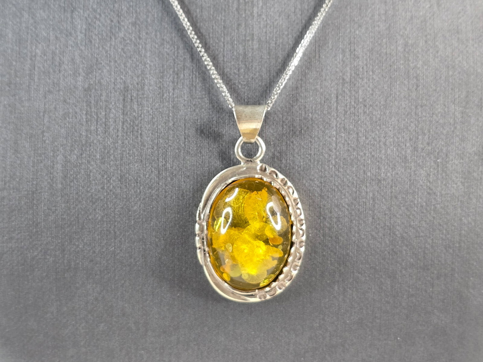 Womens Vintage Estate Sterling Silver Modernist Pendant Necklace: A WOMENS VINTAGE ESTATE STERLING SILVER MODERNIST PENDANT NECKLACE. THE PENDANT MEASURES 1 3/4" BY 1". THE NECKLACE MEASURES 19 1/2" LONG. TOGETHER THEY WEIGH 13.1g. NOT SURE IF THE STONE IS NATURAL O