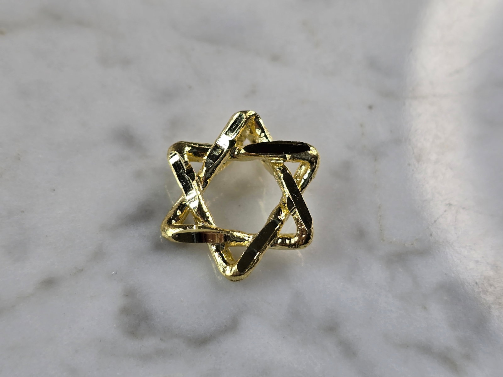 Sterling Silver Gold Tone Star of David Modernist Pendant: A STERLING SILVER GOLD TONE STAR OF DAVID MODERNIST STYLE PENDANT. PENDANT WEIGHS 2.4g, AND MEASURES 5/8" WIDE BY 5/8" LONG. MAKES A GREAT GIFT FOR THAT SPECIAL SOMEONE. ANY QUESTIONS, PLEASE DO NOT H