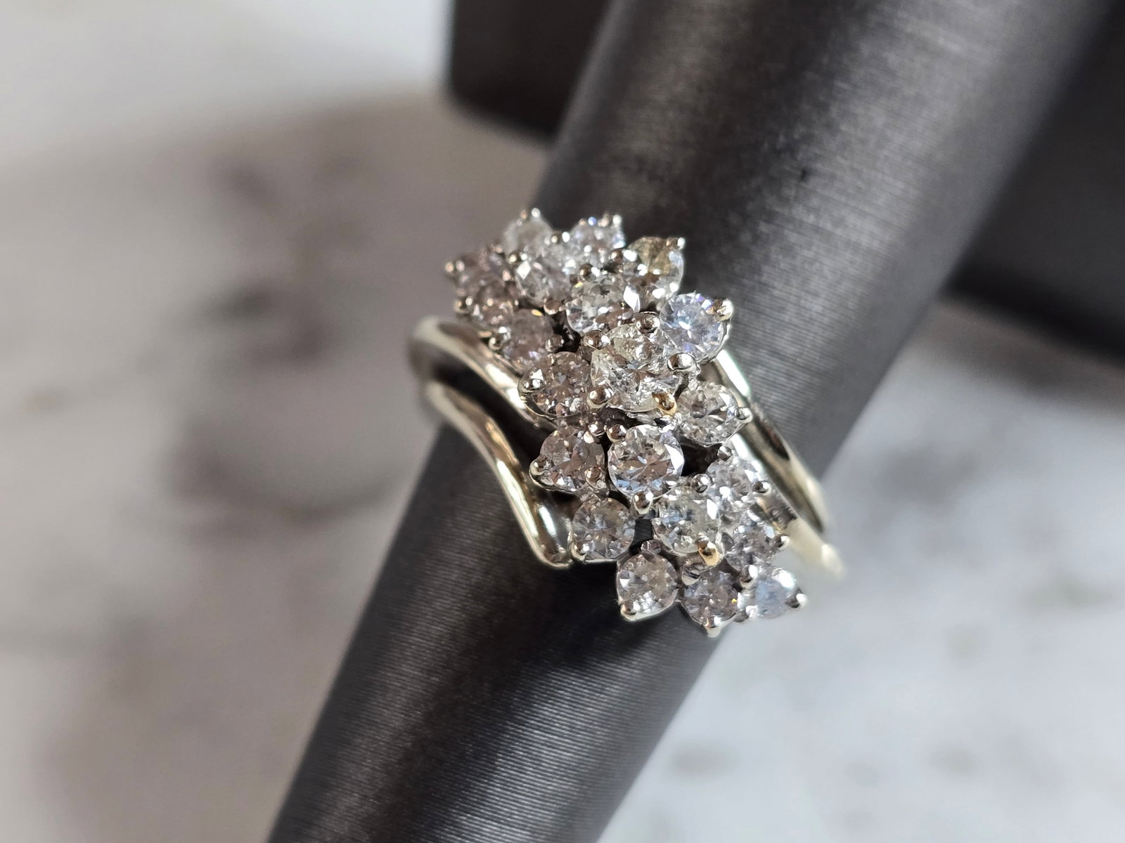 Womens Vintage Estate 18k White Gold Diamond Cluster Ring: A WOMEN'S VINTAGE ESTATE 18K WHITE GOLD DIAMOND CLUSTER RING. THE RING WEIGHS 6.3g, AND IS A SIZE 6.0. THE WIDTH OF THE RING IS 1/2". THERE ARE A TOTAL OF 1.47cts OF DIAMONDS IN THIS RING. RING IS STA