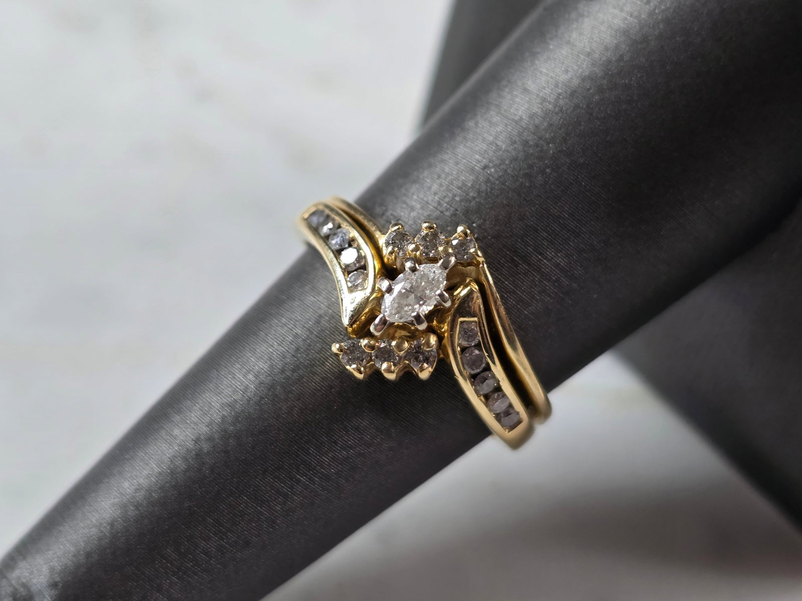Womens Vintage Estate 14K Gold Diamond Marquise Engagement Ring Set: FOR SALE IS THIS LOVELY WOMENS VINTAGE 14K YELLOW GOLD MARQUISE DIAMOND ENGAGEMENT RING SET. THE TOTAL WEIGHT IS 5.2g, AND IS A SIZE 7.75. THE MARQUISE ALONE IS ABOUT .15cts, WITH 16 TINY ACCENT DIAMO