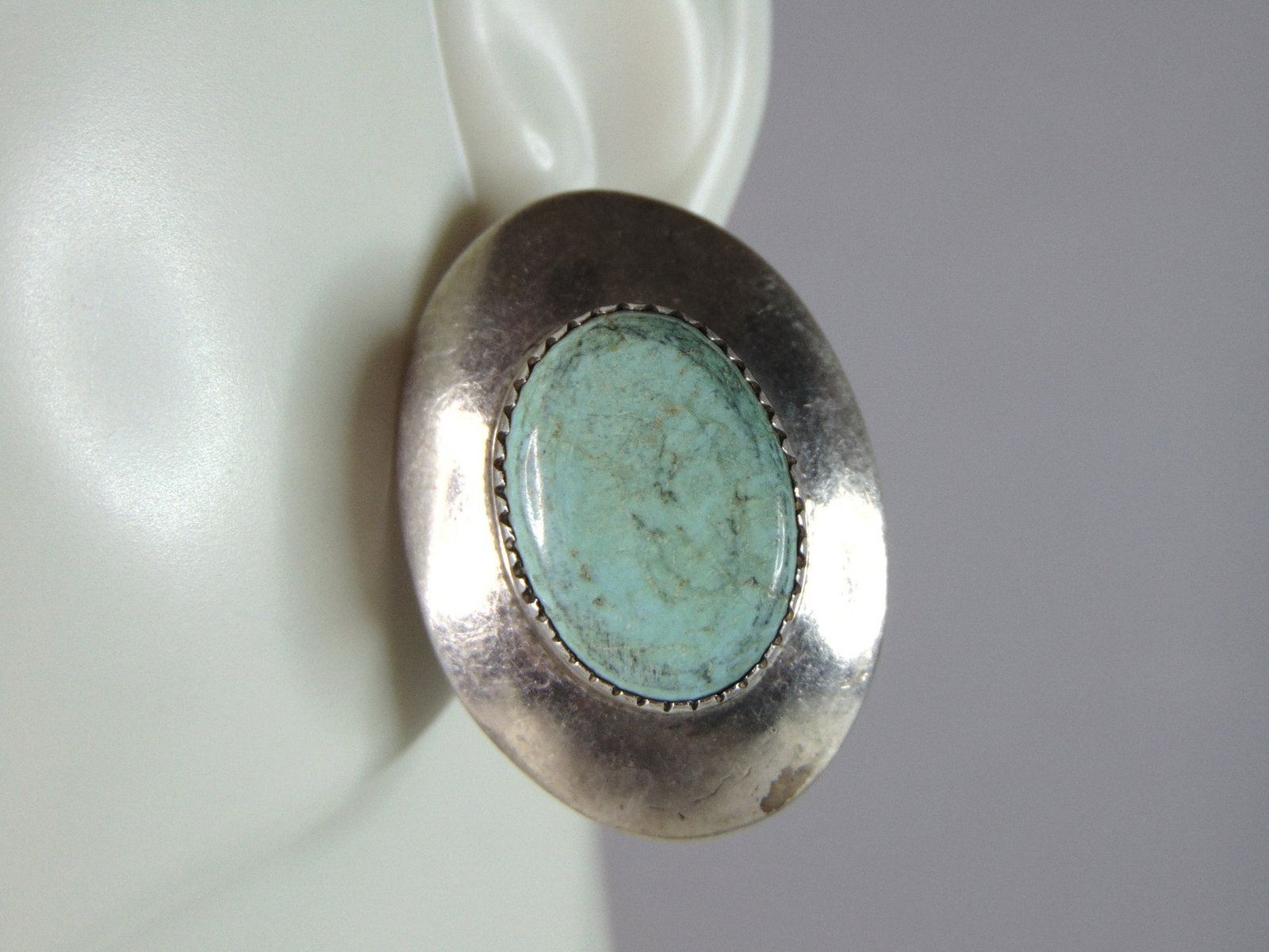 Womens Vintage Estate Sterling Silver Turquoise Earrings: A PAIR OF WOMENS STERLING SILVER TURQUOISE EARRINGS. NOT SURE IF STONES ARE NARURAL OR MAN MADE. EARRINGS WEIGH 14.4g AND MEASURES 1 1/4" LONG BY 7/8" WIDE . ANY QUESTIONS, PLEASE DO NOT HESITATE TO A