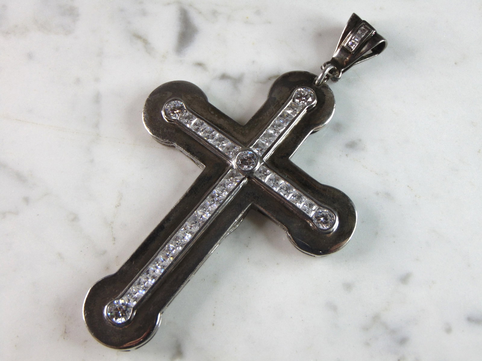 Womens Vintage Estate Sterling Silver CZ Cross Pendant: FOR SALE IS THIS WOMENS VINTAGE ESTATE .925 STERLING SILVER CZ CROSS PENDANT . PENDANT WEIGHS 28.9g AND PENDANT MEASURES 4 1/4" LONG BY 2 1/2" WIDE. MAKES A GREAT GIFT FOR THAT SOMEONE SPECIAL. IF ANY